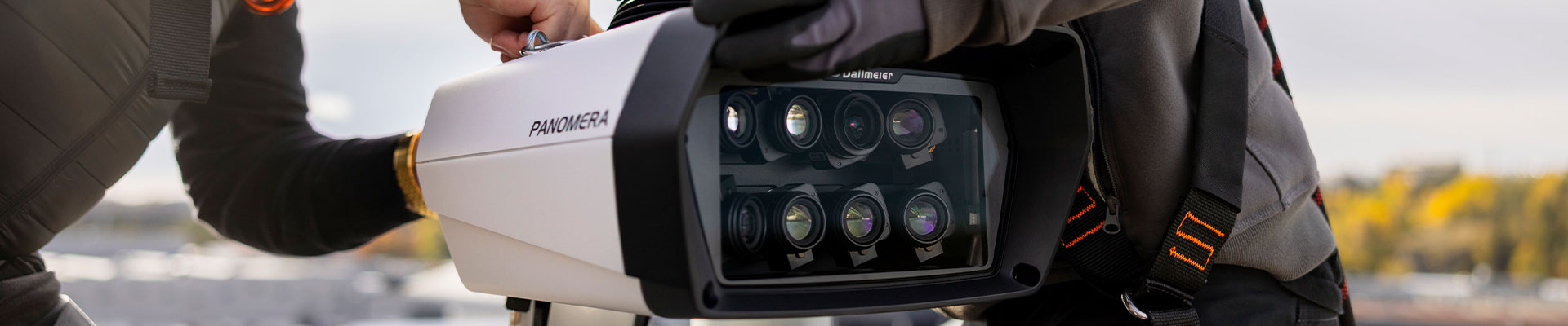 Panomera surveillance camera mounted by two people